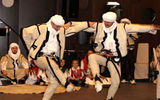 A dance group demonstrates traditional steps for an audience at the Dukagjini Hotel in Peja.