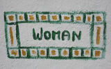 A ladies room sign in Curacao