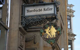 Signage for the popular Auerbachs Keller, a wine bar that Goethe made famous when he used it as a setting for a scene in his drama, "Faust."