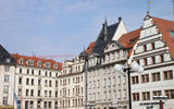 Historic buildings on the Market Square in Leipzig. The building at the far right is the 16th century Old Weigh House.