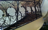 A grand staircase in the main lobby is decorated with splashes of silver and gold. French designer Lalique created the stairway.