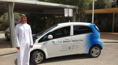 In partnership with MIT, Abu Dhabi is creating what is meant to be the "greenest" habitat in the world, Masdar City, with the goal of carbon neutrality. All materials used in its construction are fabricated to have the least impact on the environment. Pictured here, Omar Mohammed Al Busaidy, senior tourism and corp planning analyst for the Abu Dhabi Tourism & Culture Authority, with a solar-powered car for transportation within the complex.