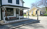 Putting a fresh coat on the Seamen’s Friend Society, adjacent to the General Store.