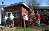 The Fire Fly shed before the volunteers sanded and painted it...