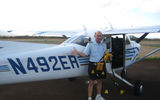 Iolani Charters offers flights down to Kalaupapa and tours over Molokai's spectacular North Shore's sea cliffs. The only other way to access the peninsula is by mule or on foot down a steep 2.9 mile cliff face trail featuring 26 switchbacks. Here the pilot discusses the yellow life preservers required during air tours in the company's 4-seat plane.