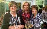 Norwegian's Senior Vice President of sales Camille Olivere, middle, with agents at a reception at the Marriott Waterfront. Photo by Johanna Jainchill