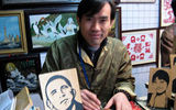 Artist Zhang Tao carves wooden tributes to Barack Obama at Yuyuan Gardens on the occasion of the president's Nov. 16 visit to Shanghai.
