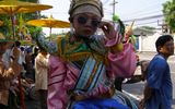 A pony boy in a small village in Thailand.