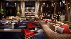 Take a tour through Manhattan's disparate districts, and you'll encounter a dizzying array of architectural, social and cultural contradictions found in few other U.S. cities. Many of those contradictions are mirrored in the borough's newer -- or, in some cases, reimagined -- design-oriented hotels. Pictured here, the two-story "living room" lobby at the Paramount Hotel.