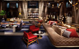 Take a tour through Manhattan's disparate districts, and you'll encounter a dizzying array of architectural, social and cultural contradictions found in few other U.S. cities. Many of those contradictions are mirrored in the borough's newer -- or, in some cases, reimagined -- design-oriented hotels. Pictured here, the two-story "living room" lobby at the Paramount Hotel.