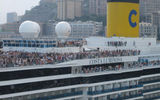Passengers watch the air show on the Costa Luminosa.