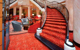 The sweeping staircase in the Queen Mary 2’s lobby.