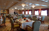 The vessel has one main dining room on Deck 1 that can fit all passengers at once, and offers open seating.