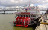 The Paddlewheel Lounge on the other end of Deck 2 is more intimate, with red leather furniture and dark wood tables.