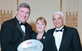 Sullivan with Julie Zadeh and Jay Talwar of the Hawaii Visitors and Convention Bureau. Hawaii took top honors in the U.S. State category for the ninth year in a row.
