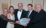 Weissmann with Travel Impressions representatives, from left: Debbie Baker, vice president of operations; Barbie Groves, vice president of global sales; Steve Gorga, CEO; and John Hanratty, COO.