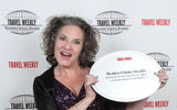 Gail Grimmett, Delta's senior vice president for New York, accepts the airline's Domestic Airline honors.