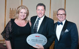 Cheryl Williams, Starwood regional vice president of sales and marketing for Hawaii and French Polynesia; Arnie Weissmann; and Chris Austin, Starwood's vice president of programs and education for the travel professional. For the fourth year running, Starwood won in the Hotel Chian: Hawaii/South Pacific category.
