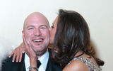 An affectionate moment between Ross Spalding, president of Crown Cruise Vacations, and Dondra Ritzenthaler, senior vice president of sales for Celebrity Cruises.