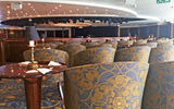 Fabrics, carpeting and soft furnishings were updated throughout the Regatta, such as in the ship's Main Lounge.