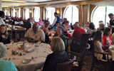 Agents touring Royal Caribbean's Rhapsody of the Seas enjoyed lunch in the ship's main dining room. Photo by Johanna Jainchill
