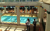 Agents on the Rhapsody of the Seas ship inspection tour the ship's enclosed pool area. Photo by Johanna Jainchill
