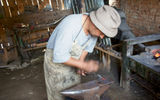 A blacksmith in the Transylvanian town of Viscri  demonstrates his ancient trade. TW photo by Michelle Baran