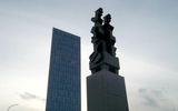 A sculpture by commemorating the founding of Reykjavik and an office tower built during Iceland's recent boom years.
