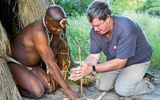 At Kalahari Plains Camp in Botswana, Bushman staff members provide insights into their traditional lifestyles such as making fire. Photo by Caroline Culbert/Wilderness Safaris