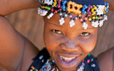 A Zulu girl who performs in a dancing show at Phezulu village in South Africa.