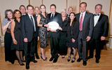 Travel Weekly's Arnie Weissmann, center, with, from left, Delta's Gail Grimmett, Nadia Seebrath, Jeff Fehlis, Houston Hayward, Eric Moon, Casey Gressette, Kristen Shovlin, Steve Sear, Kim Delucia, Eddie Erneta and Chuck Imhof.