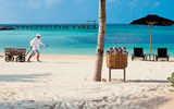 Beach butlers roam the beach at Nizuc Resort & Spa, bringing towels, beverages, menu items and sunscreen.