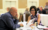 One-on-one appointments: Robert Papkin of Bobs Ultimate Travel meets with Chris Roberson of Le Meridien.