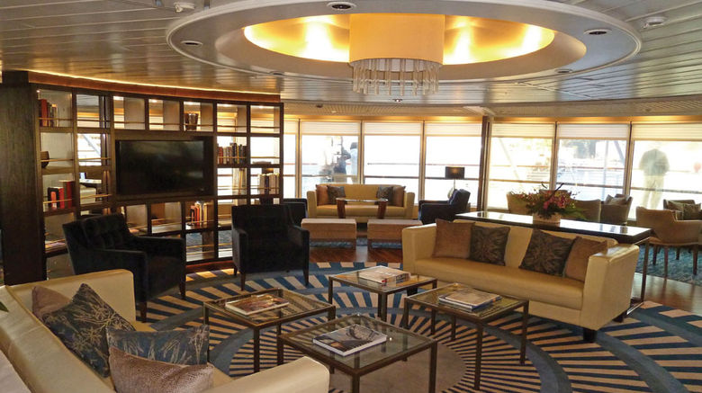 Windstar Cruises has begun sailing the former Seabourn Pride under a new name, Star Pride. After an 18-day drydock, Windstar put its own stamp on a number of public spaces. The former Constellation Lounge is now the Yacht Club (pictured here), and Windstar has installed its trademark Compass Rose lounge where The Club used to be. Windstar is playing up the yacht-like feel of the Star Pride, the first of its ships that won't have sails. See more of the changes in the following slides. TW photos by Tom Stieghorst; posted May 22, 2014