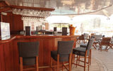 The Star Bar (formerly the Sail Bar) has been redone. Changes include free-standing wicker chairs with chair backs that replace wood stools bolted to the deck.