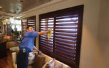 Dark wood plantation shutters are one defining feature of the new Compass Rose lounge.