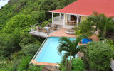 On the other hand, there are villas. Pictured here, the two-bedroom L'enclos villa. High on the hills of Colombier, it offers sweeping views of the sea.