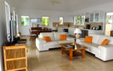 The common area is at L'enclos villa is a large, open-air, kitchen, dining and living room area.