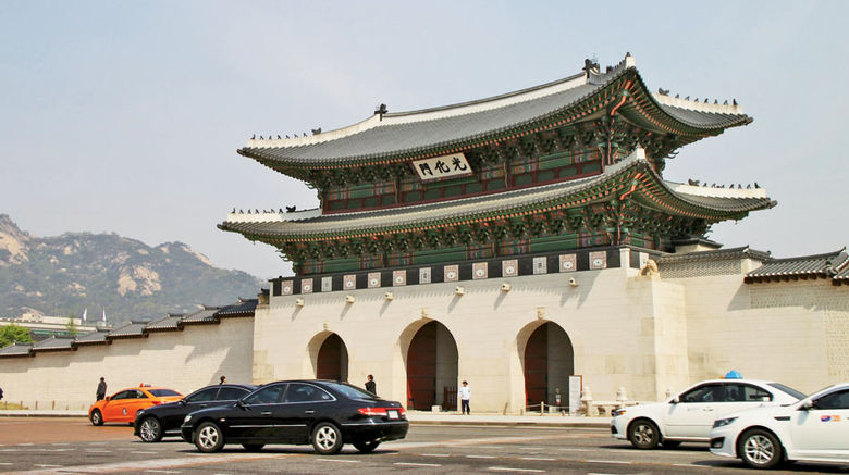 Travel Weekly contributor Nadine Godwin recently participated in a tour hosted by the Korea Tourism Organization with support from the Cultural Corps of Korean Buddhism. Besides covering Seoul's highlights, the itinerary included an overnight at a Buddhist temple and a visit to the former capital, Gyeongju. Seen here, Gwanghwamun, which means Enlightenment Gate, is the entry point to Gyeongbok Palace. The mountain at left is indicative of the capital city's surroundings. Photos by Nadine Godwin; posted July 30, 2014