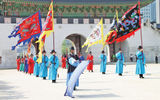 Costumed reenactors demonstrate the traditional changing of the guard ceremony at Seoul's Gyeongbok Palace.