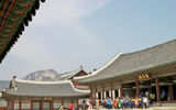 Part of the royal residential area in Gyeongbok Palace, with a bit of mountain scenery in the background.