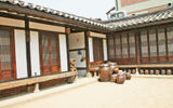 A courtyard in the model house that tourists visit in Seoul's Bukchon Hanok Village. The raised floor leaves room for under-floor heating.