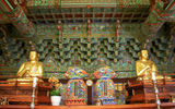 The twin Buddhas for which Daebiro Hall at Haeinsa is famous. These are described as the world's oldest wooden Buddhas (now covered in gold).