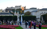 Summit guests pass through the Mirabell Garden on their way towards the foot of Hohensalzburg Fortress, or Salzburg Castle, seen in the distance.