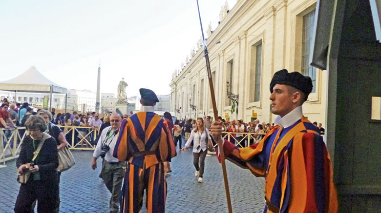 Members of the Tauck Roman Holiday Event, which featured access to attractions that are either difficult to see or are featured exclusively by Tauck, file past the Swiss Guard in St. Peters Square to get a private tour of the Vatican Gardens. TW photos by Arnie Weissmann; posted Oct. 27, 2014