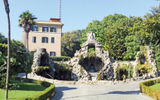 The Fountain of the Sacrament. Behind it is the current home of former Pope Benedict XVI.