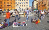 Lunch in Piazza Navona, an unscheduled bonus after the Vatican, included an opportunity to buy unlicensed "designer name purses" from unauthorized vendors.