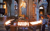 Electric candles inside the Church of Santa Maria sopra Minerva.