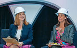 Royal Caribbean’s Vicki Freed, left, and Celebrity’s Dondra Ritzenthaler donned hard hats during a keynote presentation titled “Royal Family of Brands.”