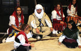A Peja dance group takes a break.